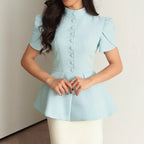 Blusa Blazer Negra con Cuello Alto y Manga Abullonada — Peplum Elegante de Oficina