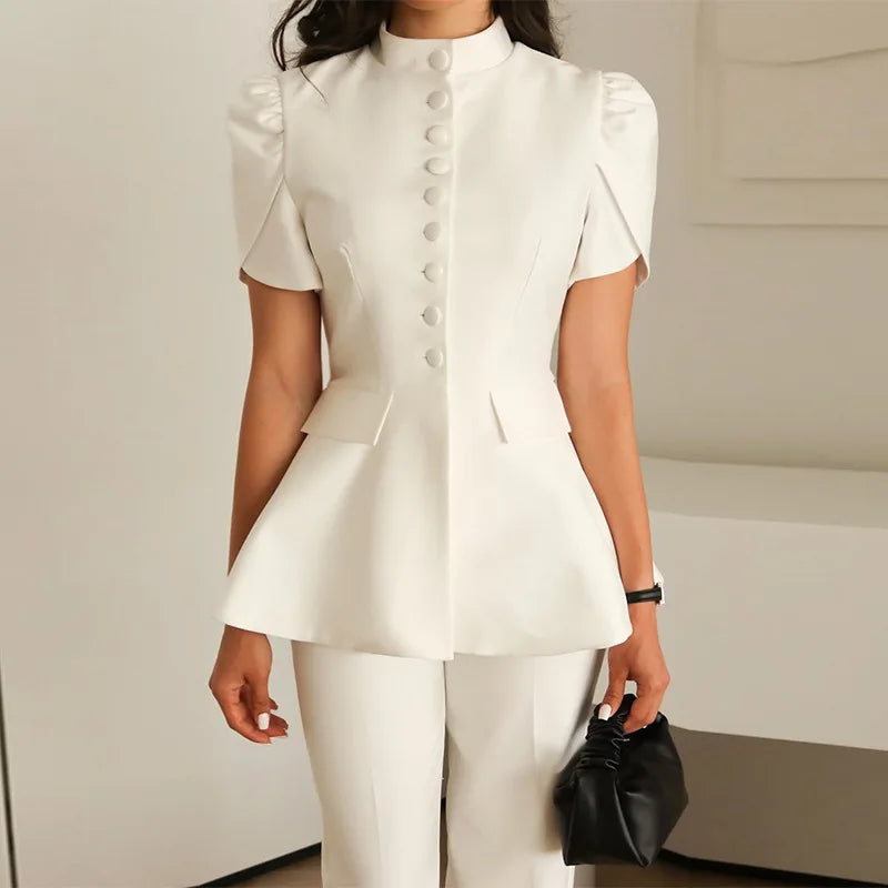 Blusa Blazer Negra con Cuello Alto y Manga Abullonada — Peplum Elegante de Oficina